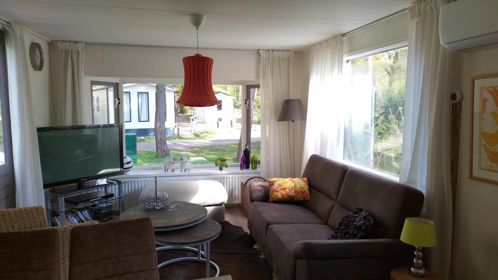 Wulft 47: Sunny 6-Person Chalet with Pool in Forest Campground IJhorst Exterior photo