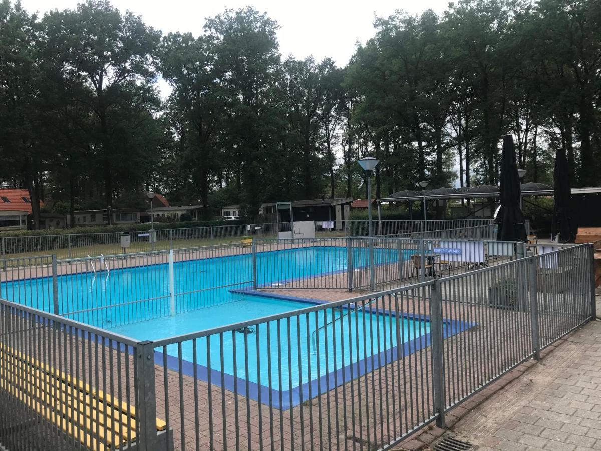 Wulft 47: Sunny 6-Person Chalet with Pool in Forest Campground IJhorst Exterior photo