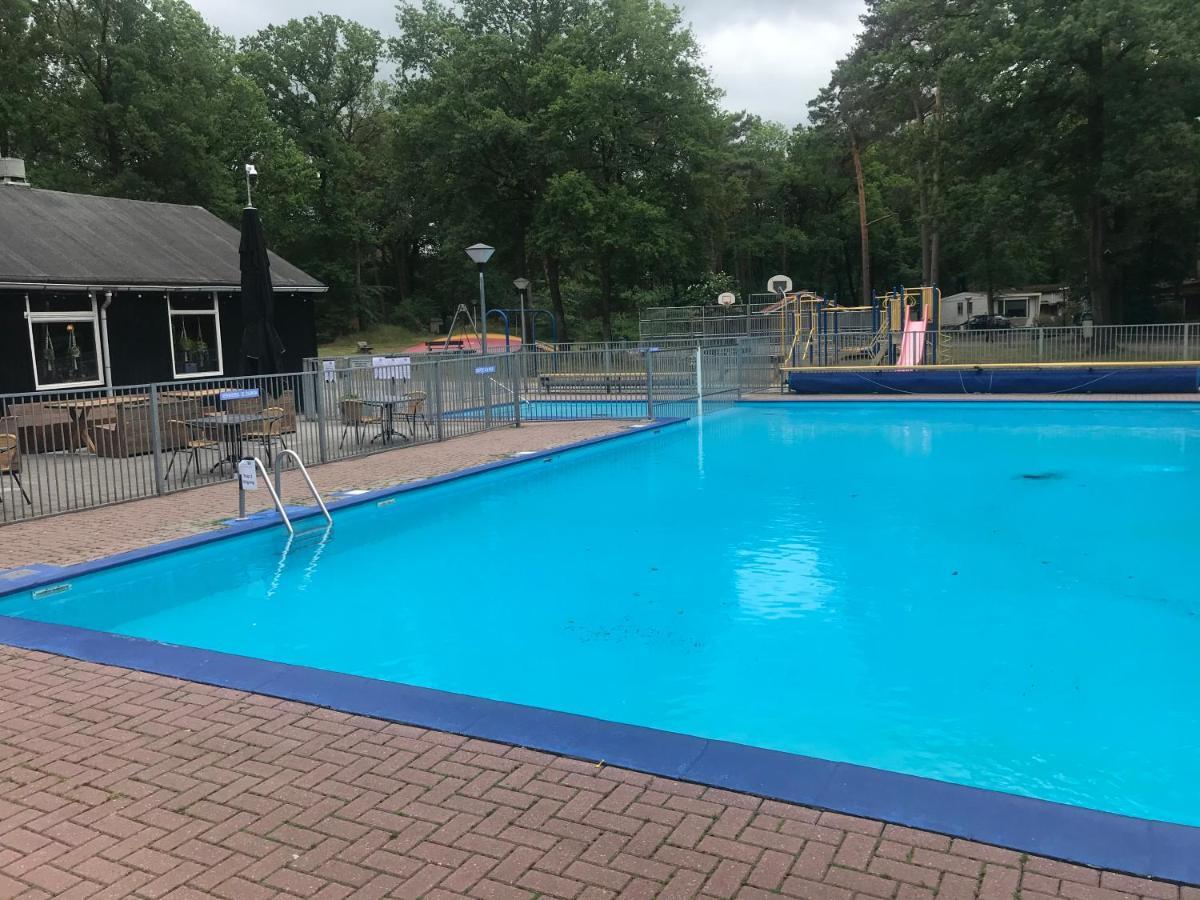 Wulft 47: Sunny 6-Person Chalet with Pool in Forest Campground IJhorst Exterior photo